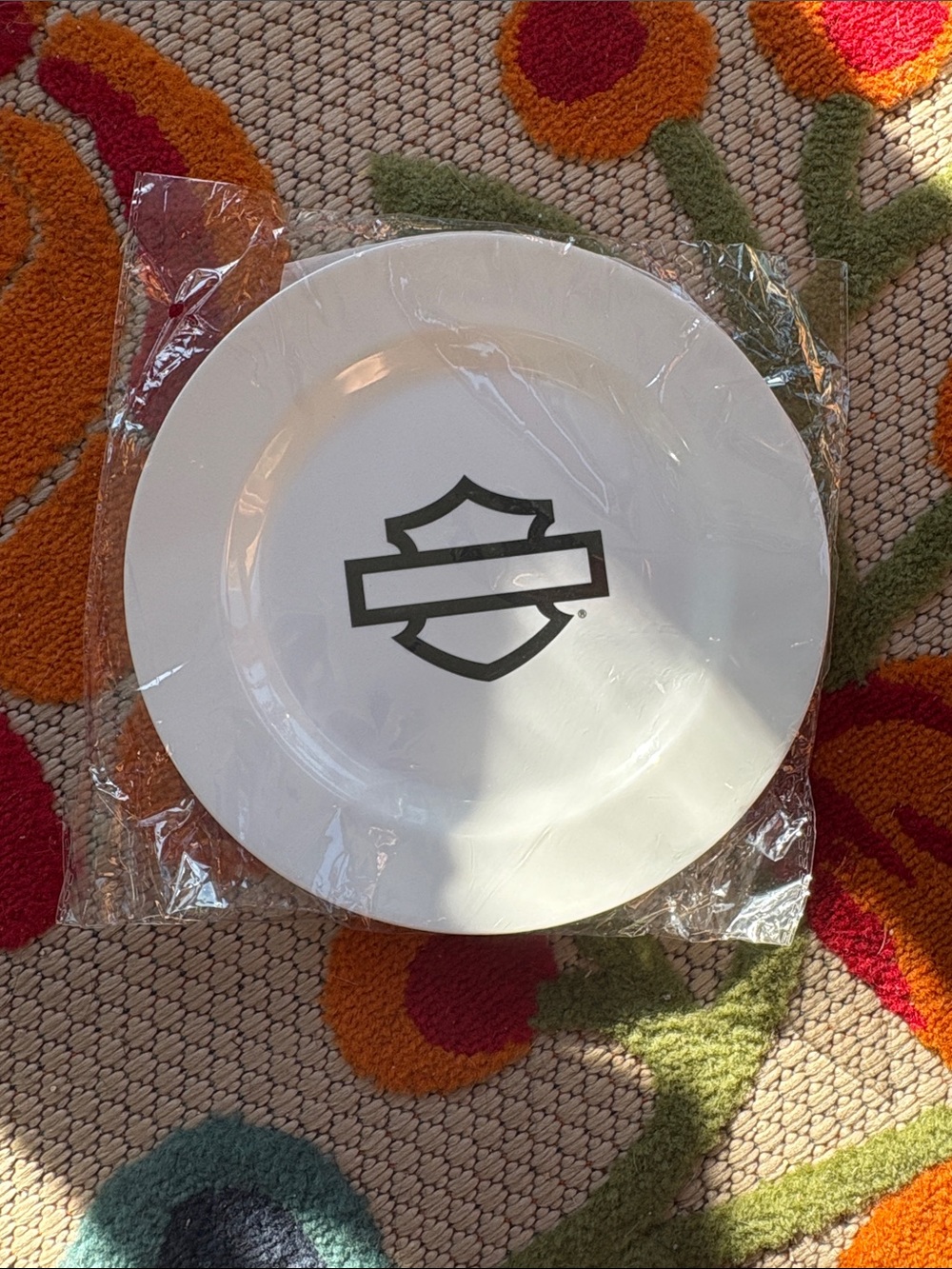 Two Harley-Davidson White Plates with Black Shield Logo